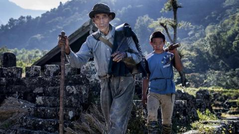 Men from the Khonoma tribe are seen walking in the village.