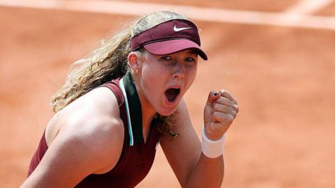 Mirra Andreeva celebrating