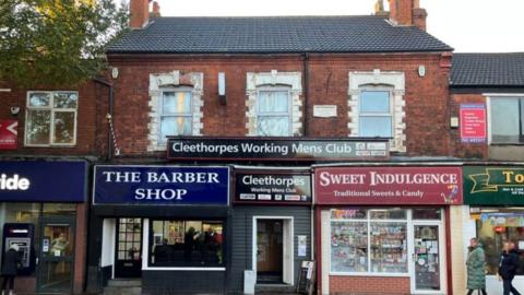 Cleethorpes Working Mens Club situated in-between Sweet Indulgence and The Barber Shop