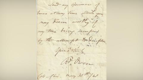 A hand-written letter on yellowed paper with looping script in an ink that has faded to brown.
