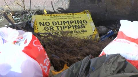 Rubbish left near 'No Dumping' sign
