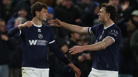 Caleb Taylor celebrates with Jake Cooper 