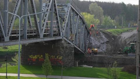 A railway bridge close to Kyiv has been rebuilt, just a month after it was destroyed by Russian attacks.