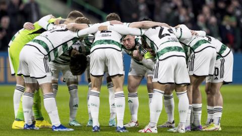 Celtic players in their pre-match huddle