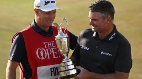 Ryan Fox with his caddie Dean Smith and the Claret Jug after winning the 154th Open Championship at Royal Birkdale