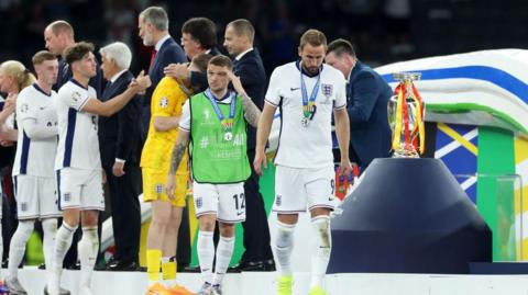 The England team receiving their runners-up medals