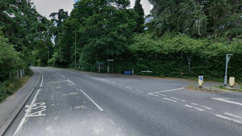 A Google streetview image of the junction of Woodlands Road and the A35 at Ashurst