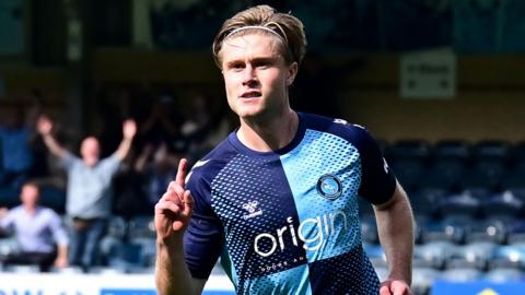 Sam Bell celebrates scoring for Wycombe