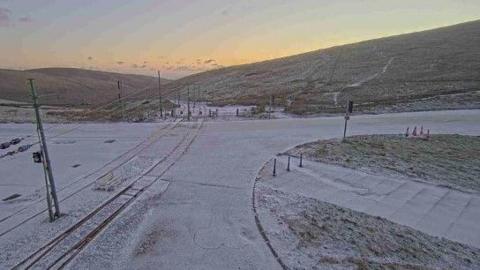 The Mountain Road at the Bungalow, with the road covered in a dusting of snow.