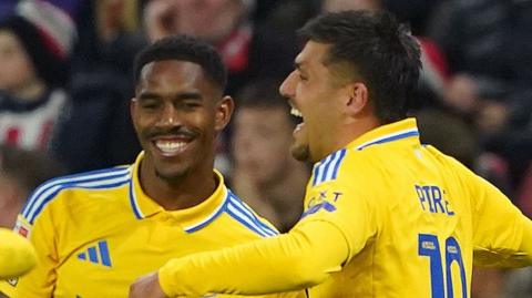 Leeds players celebrate a goal