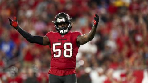 NFL linebacker Shaquil Barrett celebrates during a game.