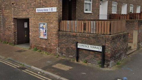 A general view of Florence Terrace, including a street sign of the same name.