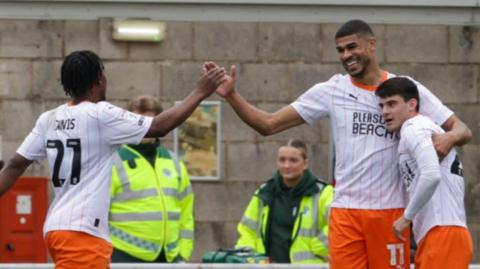 Ashley Fletcher celebrates his goal at Northampton