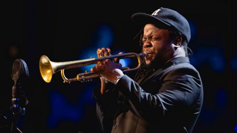 A solo trumpet player performing in the Royal Albert Hall