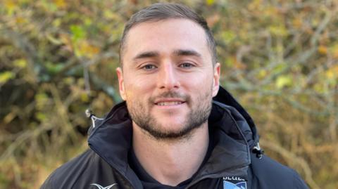 Bedford Blues' Dean Adamson photographed outside his home