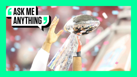 uper Bowl XLII, View of hands of New York Giants victorious, holding Vince Lombardi trophy during celebration