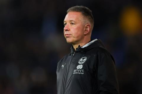 Peterborough United boss Darren Ferguson watching a game from the touchline