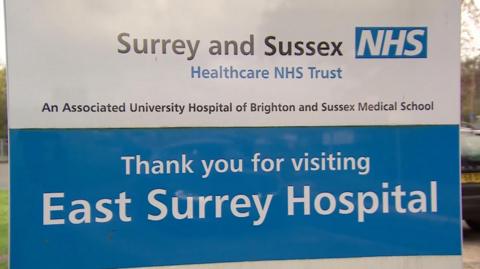 A hospital sign that says thank you for visiting East Surrey Hospital