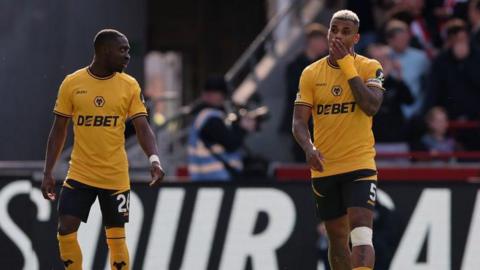 Wolves midfielder Mario Lemina reacts to giving a penalty away against Brentford