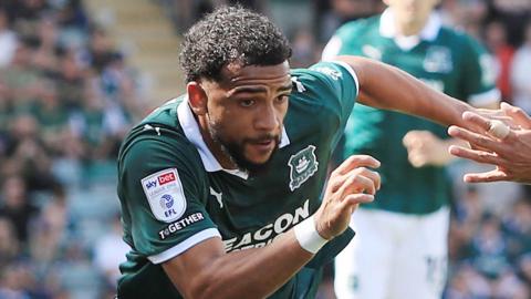 Xavier Amaechi in action for Plymouth