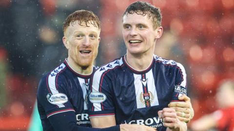 Simon Murray and Ethan Hamilton celebrate