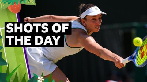 Elise Mertens hits ball with racket