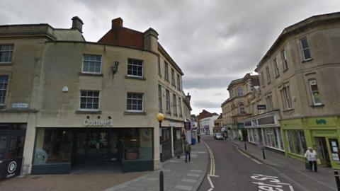 Google maps view of Coffee Number One on Fore Street in Trowbridge. The cafe is on the left, and a road is next to it. On the right, there are more buildings.