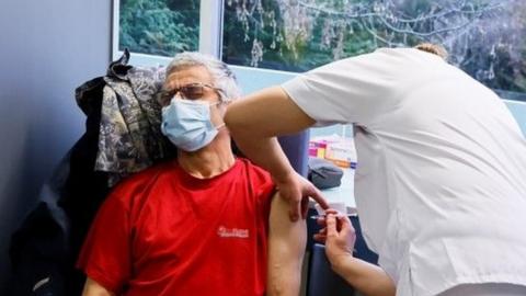 Man being given AstraZeneca jab in Melun outside Paris, France
