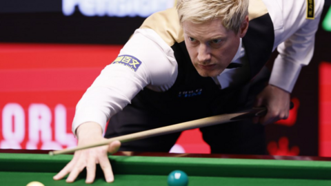Neil Robertson takes a shot