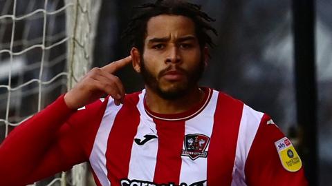 Sam Nombe celebrates