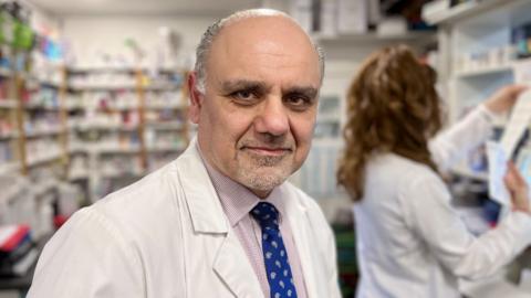 Owner Maziar Moaddabi at the Vauxhall Street Pharmacy in Norwich
