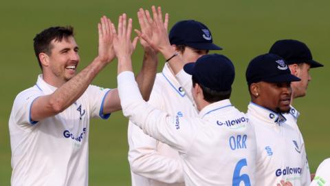 Steven Finn celebrates a wicket