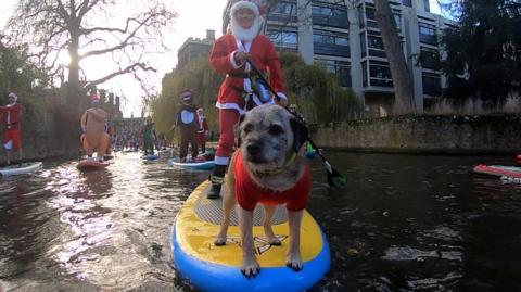 Santa on a paddleboard