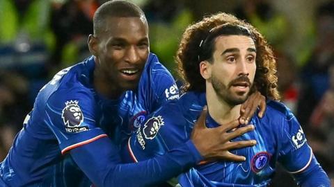 Marc Cucurella celebrates after scoring