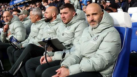 Chelsea manager Enzo Maresca smiling while in the technical area against Sunderland