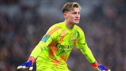 Arsenal goalkeeper Jack Porter in action against Bolton Wanderers