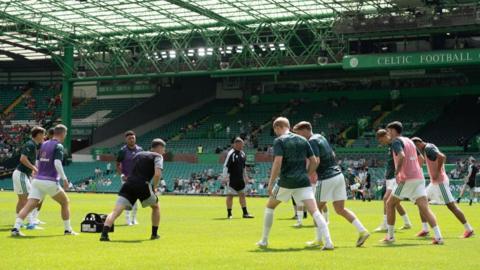 Celtic players warming up