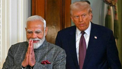  US President Donald Trump and Indian Prime Minister Narendra Modi arrive to hold a joint press conference in the East Room of the White House in Washington, DC, on February 13, 2025.