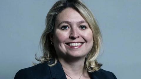 Karen Bradley's parliamentary picture - a woman with short blonde hair smiles at the camera. 