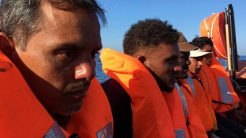 Migrants rescued from a ship and taken to the Ocean Viking