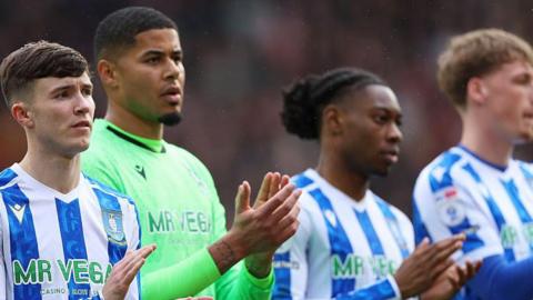Sheffield Wednesday players applaud fans
