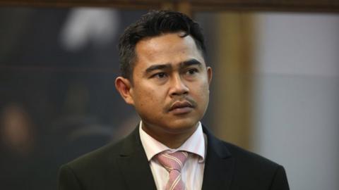 Malaysian diplomat Muhammad Rizalman stands in the the Wellington High Court, in Wellington, New Zealand, Monday, 30 November 2015