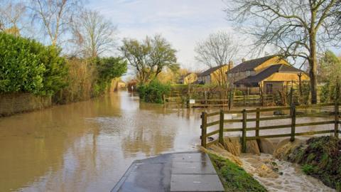  Flooded roads in a residential area in Somerset 