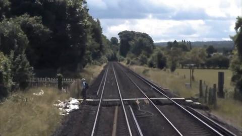 Near miss between train and walkers