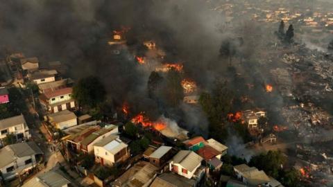 Aerial view of the forest fire that affects the hills of the city of Viña del Mar in the Las Pataguas sector, Chile, taken on February 3, 2024. Vina del Mar is a city within the Valparaiso region.