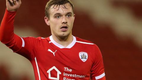 Luke Thomas in action for Barnsley