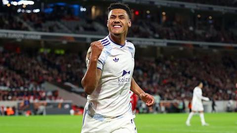 Ollie Watkins celebrates scoring the only goal in the first leg at Lille