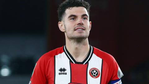 Former Sheffield United defender John Egan