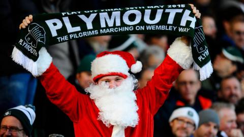 Plymouth Argyle fan dressed as Santa