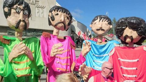 Beatles effigies circa Sgt Pepper at the start of the 2016 two cathedrals walk.